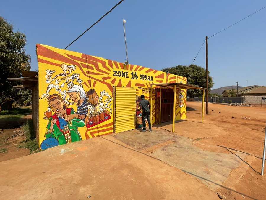 Zone 14 Spaza with Ricoffy artwork across the storefront